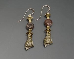 Handmade brass owl earrings with faceted petrified wood beads and gold-filled wires.