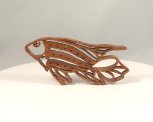 Handcrafted wooden tropical fish ornament made from 1/4-inch thick oak, finished with shellac, designed for holiday decor or year-round display as wall art.