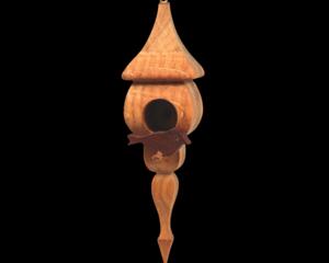 Handcrafted miniature wooden birdhouse ornament shaped like an icecicle with a pointed roof and base, featuring a rounded entrance hole and a perched bird, and made from reclaimed hardwoods finished with a satin shellac.