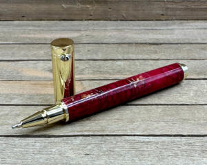 Red resin, gold hardware, cast mini pine cones