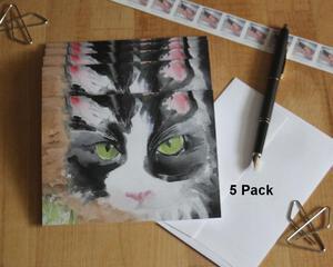A cute watercolor of the face of a tuxedo cat is printed on the front face of each feline note card in this 5 card set.  Blank inside.
