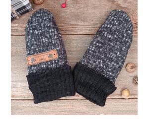 Handmade speckled black and white baby mittens with black ribbed cuffs, made from soft fleece; cozy thumbless winter mittens for infants.