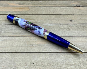 Blue and gold DnD ballpoint pen with DnD Postage Stamps 