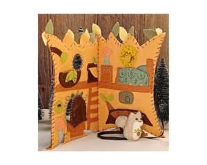 Felt squirrel in its tree house home surrounded by tiny woodland elements — handmade quiet-book toy for imaginative pretend play.