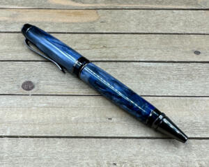 navy blue and gray resin ballpoint pen with gunmetal hardware