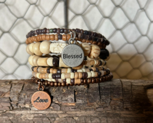 Boho wood bead bracelet with statement charms, it’s pretty and eye-catching bracelet to wear. It wraps around your wrist about nine times.