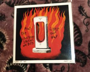 a print of a watercolor painting of a Tesla charging station burning with the text "may the charging stations we burn light our way"