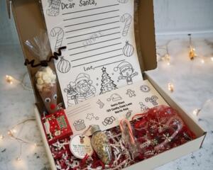 Handmade Dear Santa Letter Kit gift box with letter to Santa, cocoa cone reindeer, candy canes, magic reindeer food, and festive filler