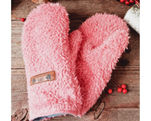 A cozy pair of children's mittens for ages 8 to 10. Handmade mittens crafted from fluffy coral pink fleece; warm, cozy and winter ready.