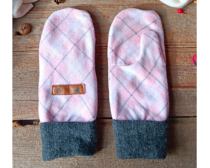 A cozy pair of teen, small woman’s handmade mittens crafted from soft pink argyle pattern fleece with ribbed cuffs; handmade & winter ready.