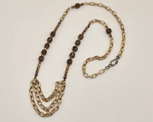 Handmade 22-inch necklace with blue and bronze Czech glass barrel beads, bronze hematite, and vintage gold chain from a family heirloom.