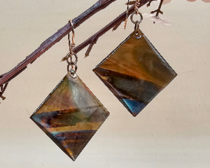 Handmade flame-colored copper diamond earrings with UV resin seal and handcrafted copper ear wires.