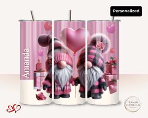Pink gnome couple tumbler with heart balloon and vertical name Amanda. Close detail of fuzzy pom beanie and pink plaid hat on gnome


