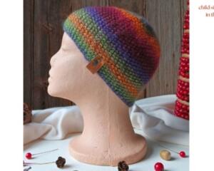A babies & toddlers sized rainbow ombre hat knit with wool. Perfect for winter a gift for a baby or toddler ages 1, 2, 3, 4, 5 years old.
