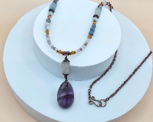 Handmade necklace with amethyst teardrop pendant, aquamarine beads, crystals, copper chain and hook clasp