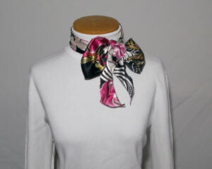 This can be tied in a wonderful bow at the neck showoff the colors and design of the fabric.