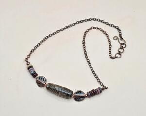 16.5 inch handmade necklace with Dzi agate focal, mookaite rondelles, and copper leaf accents on a copper chain with handmade hook clasp