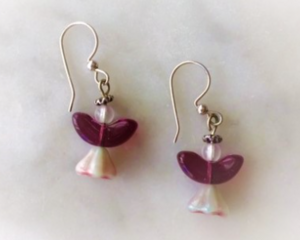 Little angel earrings members of a divers group