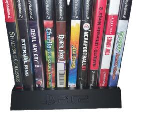 PlayStation 2 Videogame Sony Game Storage Display PS2 Desktop Shelf Organization Gamers Streamers Metal Gear Solid Grand Theft Auto Bully