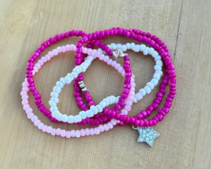beautiful pink and white 5 bracelet set. stretchy
