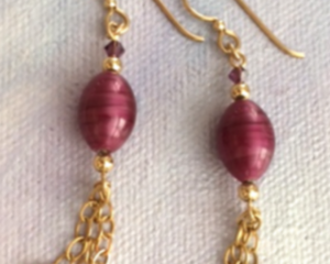 Ruby red earrings with 14 Karat gold filled decoration
