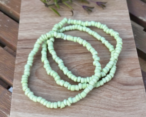 green stretch seed bead bracelet, for valentines day.
