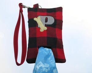 Personalized Buffalo plaid dog poop bag holder,  red and black plaid with bone motif with a  personalized Embroidered letter