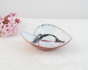 heart shaped copper enameled trinket ring dish with black and red hearts stenciled on shite, verdigris, purple