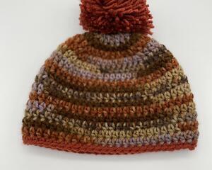 brown beanie with pompom