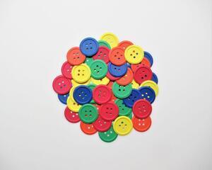 Scrapbook die cut and embossed buttons, primary colors