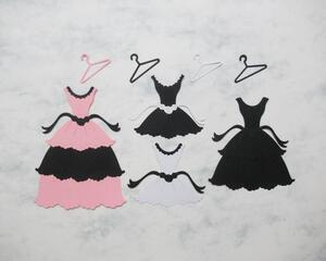 Fancy die cut dresses and hangers, pink, black, and white