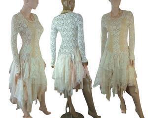 White and peach lace tattered wedding dress. Just below knee length with a lace up front. One of a kind, hand made, eco-friendly boho style wedding dress.