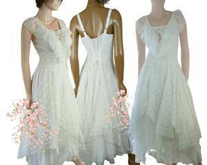 Base garment is a long, white cotton dress with added lace and ruffle and includes a lace up back and adjustable spaghetti straps. Fits multiple sizes as do most of Marie Sophia dresses.  One of a kind, hand made, eco-friendly bohemian style dress.