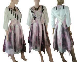 White, back pink and red hippy style dress. Features black fringe around the neckline and a lace up back. The skirt contains soft black sheer fabric with pink roses. One of a kind, hand made, eco-friendly bohemian style dress.