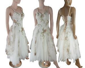 Three views of a long, white, tattered, crochet front with pink, green flowers and lace up back wedding dress. One of a kind, eco-friendly, handmade, bohemian style event and wedding dresses.