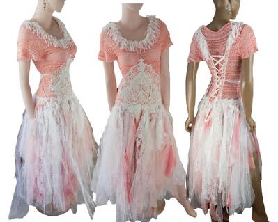 Peach and white wedding dress. Long lace and tulle tatters in the skirt with crochet on the bodice. Lace up back for a snug fit. Cap sleeves. Fringe around the neckline. One of a kind, eco-friendly, hand made, bohemian style dress.