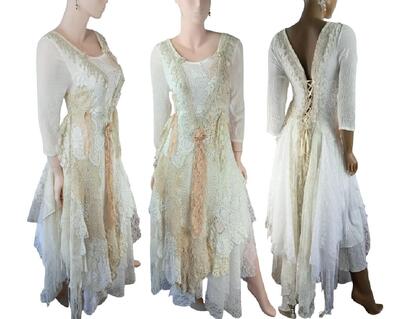 A white, cream and tan long wedding dress. Features lots of crochet on the front with fringe and a lace up back. Beautiful gown. Lots of lace and soft fabrics in the tattered skirt. One of a kind, hand made, eco-friendly bohemian style dress.