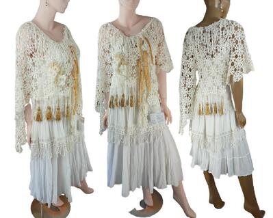 A two layer outfit. The under layer is a cotton dress with a poncho style crochet throw over the top. Added gold fringe and tassels with ribbon ties. One of a kind, handmade, eco-friendly, bohemian style clothes.