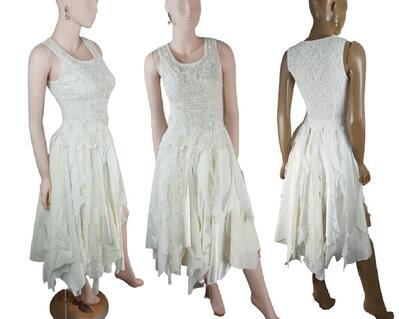 Small size cream silky stretchy tattered wedding dress. Side zip, very cute.