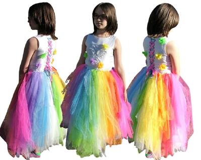 All the colors of the rainbow in a bridesmaids dress that will fit around a 10 year young lady.
Features flowers and butterflies.