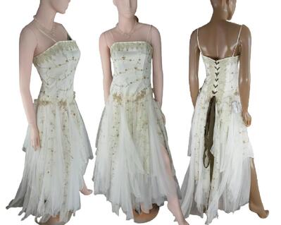 Three images of a long tulle wedding dress with a corset bodice. Green and white dress with little flowers here and there. One of a kind, hand made, eco-friendly, boho style wedding dress.