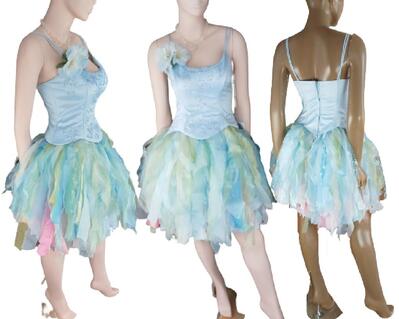 This dress is fabulous and I loved making it. A Cinderella look that moves freely as you move and dance. Masses of baby blue, pink, yellow, green, aqua and white tatters mostly organza fabric. The bodice is boned and has sparkles. The dress has straps for over the shoulder.