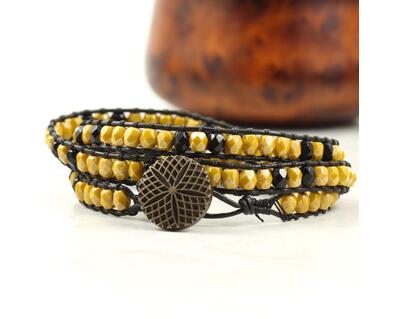 Black leather bracelet with small glass beads