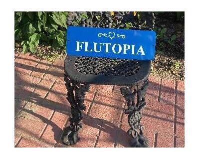 The Flutopia sign is a  stunning royal blue with heart and swirl design and just one word from a friend to me "Flutopia".  It is made of aluminum with vinyl letterings for indoor or outdoors.Great for a teaching studio, dorm room, or hung in a space everyone will view.