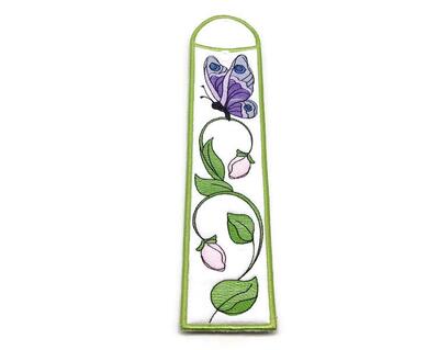 Here's a handmade nail file case for those that are on the go.  Have this nail file cover handy in your purse for those times your break a nail.  This pouch can be used for many different things, reusable straw holder, cosmetic brushes, or just carry it as a nail repair accessory. 

    What you get:  Your choice of one nail file pouch done in machine embroidery. Only small emery board is included.  You can choose the option to purchase the 100/180 coarse emery file.
    Fabric color:  White front, with a beautiful butterfly embroidered purple, pink and light blue thread. Has a medium green pin dot back and green satin stitch outer edge.
    Fabric used:  Front is two layers of white 100% cotton fabric, lined with one layer of polyester batting. Back is two layers of 100% cotton medium green pin dot fabric with one layer of polyester batting. Machine embroidery is done with polyester machine embroidery thread. Snap closure. Fabrics have been preshrunk in clear water.
    Size: 2 1/2 inches x 8 3/4 inches when closed.
    Care:  Hand- machine wash in warm water with like colors.  Air dry.  No bleach.

NOTE:  This hand crafted article is made of all new materials.  Fabric have been pre-rinsed to avoid shrinkage and color runs. There may be some water soluble stabilizer residue left from the construction technique that may appear sticky and hard if it absorbs liquids, but will be totally removed in the items first complete washing.