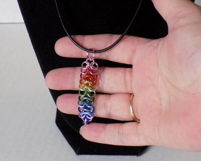 Rainbow European 4-in-1 chainmaille pendant with 12 colors of anodized aluminum rings on a leather cord necklace, handmade in the USA by RainbowMaille