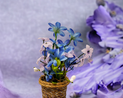 Miniature basket of flowers for a spring tiered tray