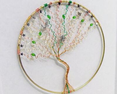 gold and green wire tree sculpture by RainbowMaille
