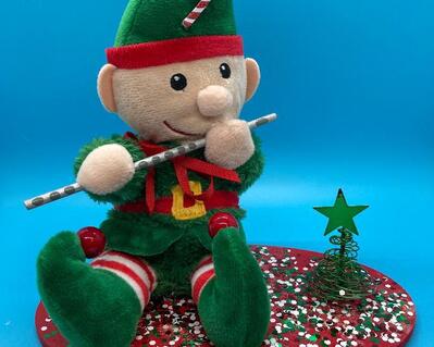 This is a fun item for us at Flute Emporium.  We have sold so many elves in the past 20+ years.  Either they are flutists, Santa's helper, holder of salt and pepper shakes...you name it we do it. Soft, cuddly, funny, adorable, not to big and not to small.  Just ADORABLE doing whatever he is assigned! He also has a wonderful glitter holiday wish he sometimes delivers to special people - that's how he says it and how he works it!