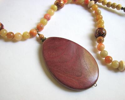 Large pendant of natural Costa Rican Purple Heart wood.